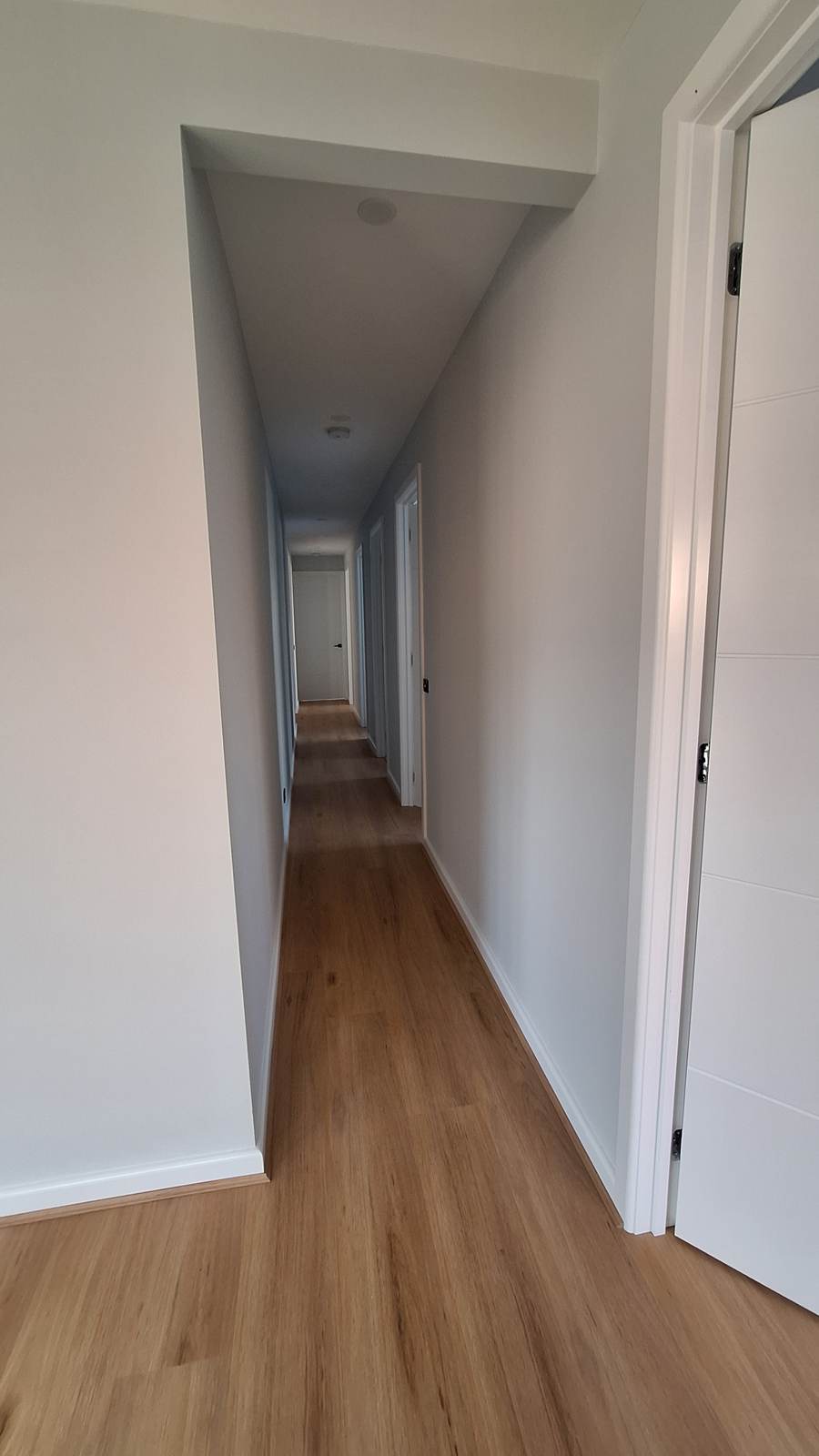 Hallway leading to bedrooms